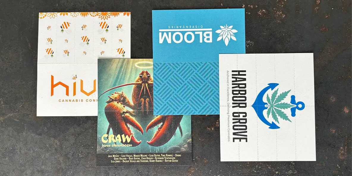 Four custom Crutch Cards displayed on a dark surface, featuring branding for Hiv, Bloom, Craw, and Harbor Grove with unique designs.