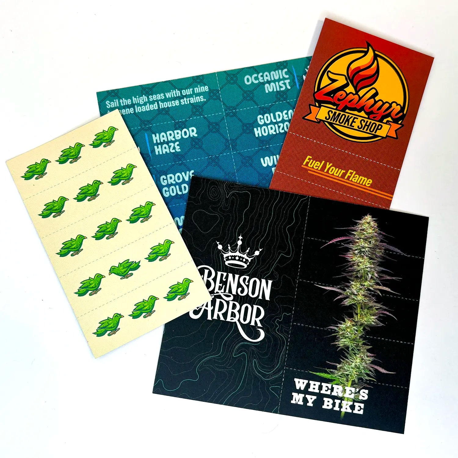 Assorted Crutch Cards on a white background featuring cannabis branding from Zephyr Smoke Shop, Benson Arbor, Harbor Grove, and more.