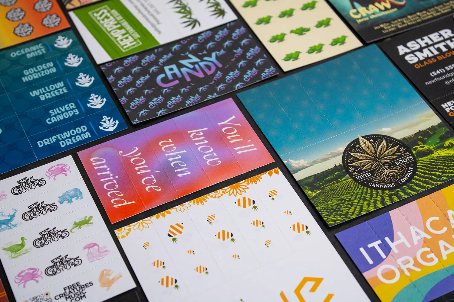 A selection of custom-designed Crutch Cards rolling tips featuring unique artwork, bold typography, and cannabis-inspired branding. These premium, perforated rolling tips showcase the creative and artistic customization options available for brands in the cannabis industry.