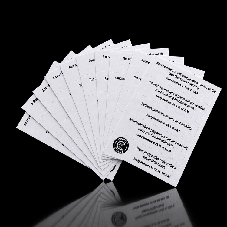 Perforated Rollers Choice Crutch Cards with fortunes and lucky numbers and a logo printed on the surface.